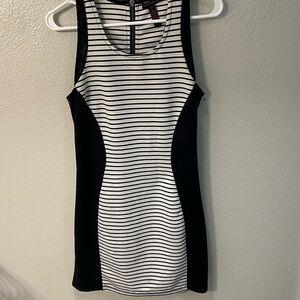 Sleeveless silhouette dress. Size medium. Zip up back